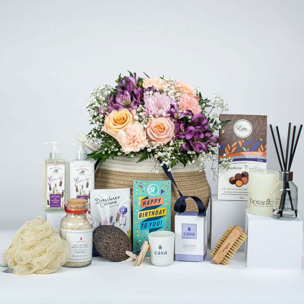 Spa Products With Flowers And Jute Basket
