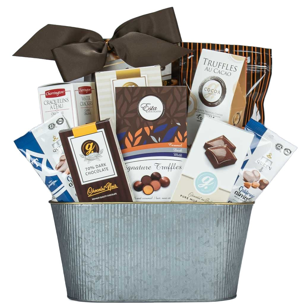 Sympathy gift basket to offer your support and condolences filled with gourmet treats and comforting sweet chocolates.