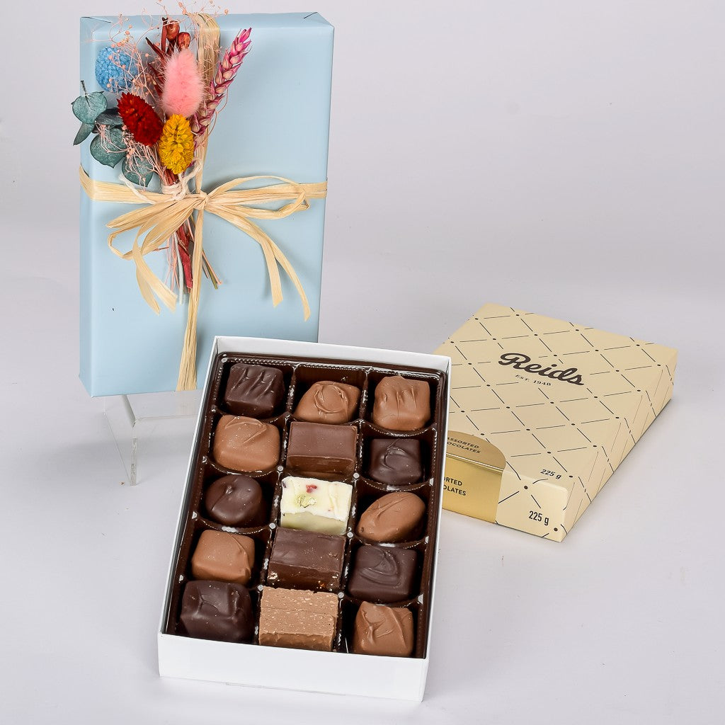 Delicious Milk And Dark Chocolates With Dried Flowers