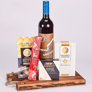 Cheese Board With Red Wine, Salami, Cheese And Cookies