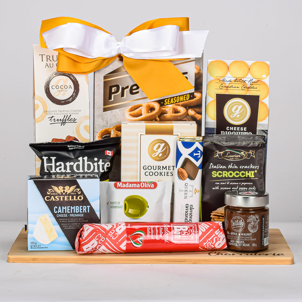 Charcuterie Board With Pretzels, Truffles, Crackers, Chips, Olives, Compote, Italian Salami and Cheese