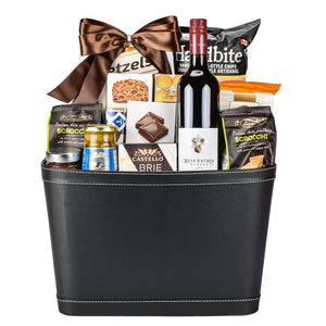 Corporate Gift Leather Basket With Chips, Pretzls, Olives, Canadian Red Wine, Olive Oil Crackers, Cheddar Cookies, And Artisinal Crackers