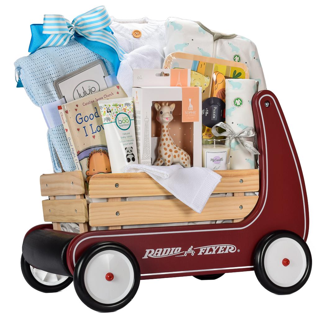 Radio Flyer Wagon With Blue Organic Footed Sleep Set, Animal Puzzle, Baby Lotion, Book And Sophie The Girafe