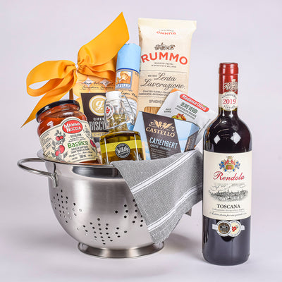 Silver Colander With Pasta, Tomato and Basil Sauce, Red Wine, Olive Oil And Cheese