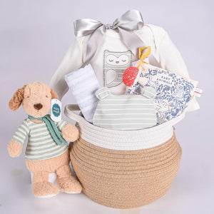 Neutral Jute Baby GIft Basket With Organic Cotto Longsleve Onesie, Muslin Blanket Organic Cotton Beanie, And Dog Plush