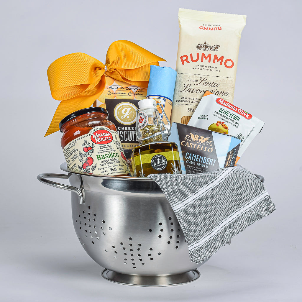 Silver Colander With Rummo Italian Spaghetti, Tomato And Basil Sauce, Olive Oil, Cheese And Salami