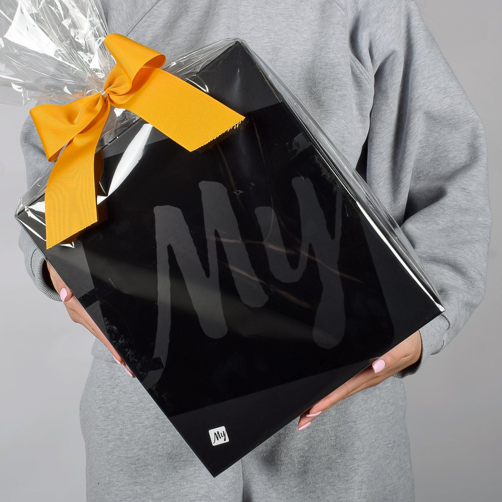 Signature Black My Baskets Gift Box Wrapped In Cellophane And A Gold Bow