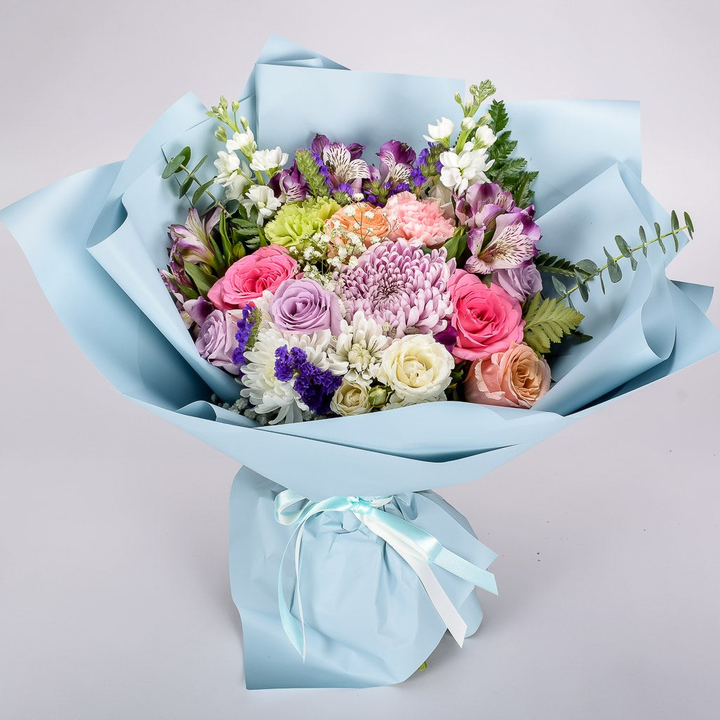 Mixed Floral Arrangement Wrapped In Blue Korean Paper