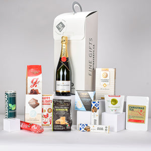 Moet Champage, Delicious Mocktail, Truffles, Cookies, Cheese, Olives, Crackers, Salami, Milk Chocolate, and Crackers Wrapped In A Eco Friendly Gift Box 