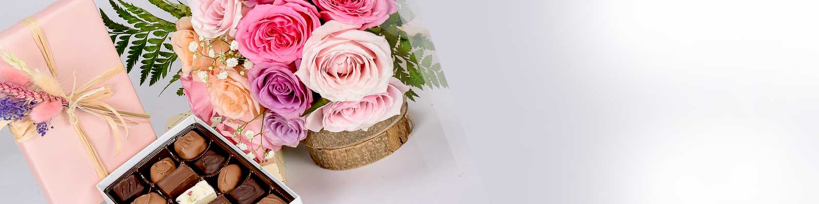 Chocolate box and roses same day gift delivery.