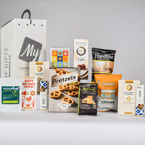 White Handheld Box With Assorted Snacks that in include Pretzels, Chips, Chocolate Bars, Popcorn, Cookies And Tea