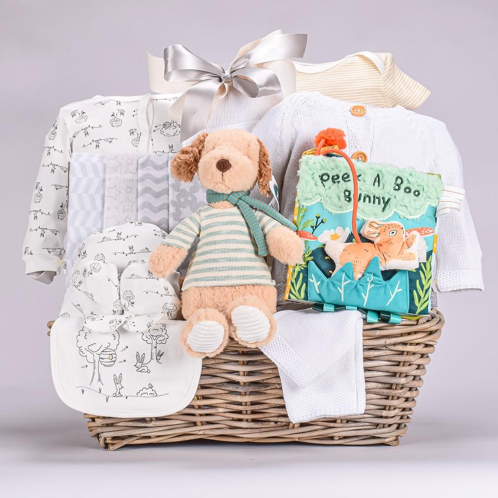Rattan Brown Gift Basket With Baby 5 Piece Sleep Set, Cardigan Set, Dog Plush, And Grey Recieving Blankets 