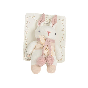 Stuffed rabbit plush with pink accents on a white background