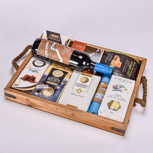 Gourmet Items In A Wooden Serving Tray With Red Wine 