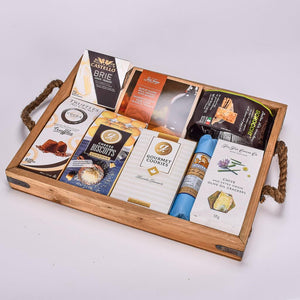Gourmet Items In A Wooden Serving Tray With Rope Handles 