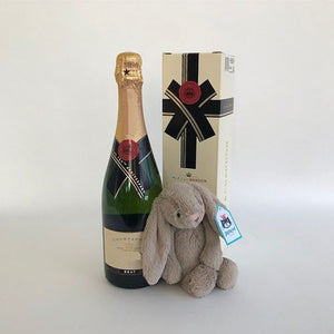 Champagne and plush gifts.